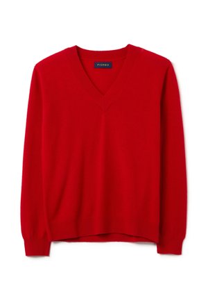 Pull en laine rouge avec un col en V, des manches longues, des poignets et un ourlet côtelés. Texture douce, design léger adapté à la superposition.