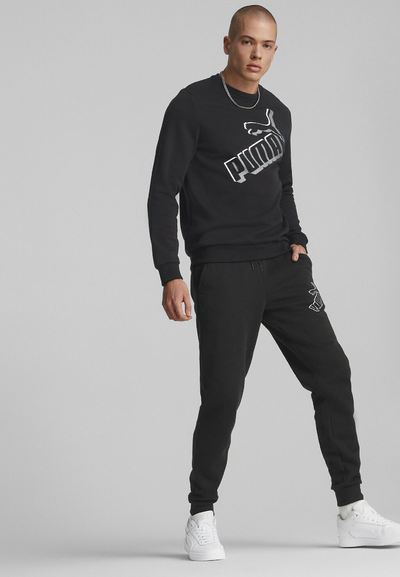 Puma ESSENTIALS+ BIG LOGO Tracksuit bottoms black Zalando.ie