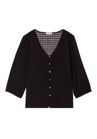 Schwarze Bluse mit Knopfleiste und tiefem V-Ausschnitt, dreiviertellangen Puffärmeln und goldenen Knöpfen. Innen mit einem geometrischen Muster.