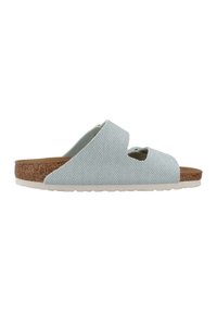 Sandali slip-on azzurro chiaro con design a ritagli, tomaia in tessuto testurizzato, soletta in sughero e suola in gomma bianca.