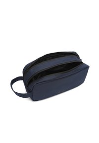 Beauty case in tessuto blu navy con due scomparti con zip, base piatta e manico laterale per un facile trasporto. Interno nero.
