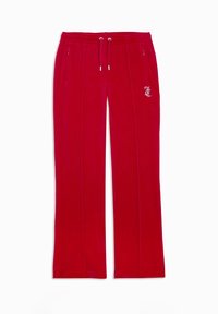 Pantaloni sportivi in velluto rosso con vita elastica, cordoncino, tasche laterali e un logo accentato sulla gamba sinistra. Texture liscia, taglio dritto.