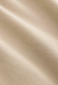 Next Polo - neutral stone