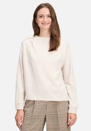- Bluza