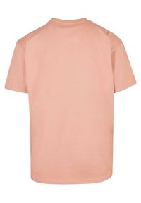 Merchcode NEVER GIVE UP HEAVY OVERSIZED - Marškinėliai su spaudiniu - amber