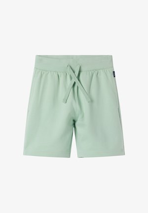 Lichtgroene elastische taille shorts met voorgeknoopt koord en zijzakken, gemaakt van zachte stof, casual stijl.