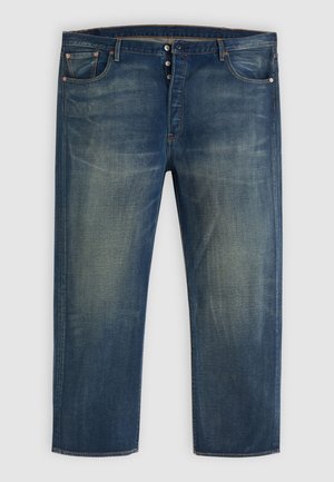 Blue denim jeans with button fly, classic five-pocket design, and faded detailing on thighs and knees.