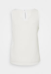 Haut blanc sans manches avec une ouverture clé à l'arrière, réalisé dans un matériau lisse avec une texture subtile et sans motifs ni ornements visibles.