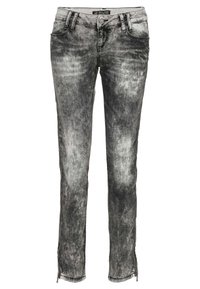 Vaqueros de mezclilla gris desgastados con corte ajustado, que cuentan con un cierre de botón en la parte delantera y cremalleras en los dobladillos de los tobillos para aberturas ajustables.