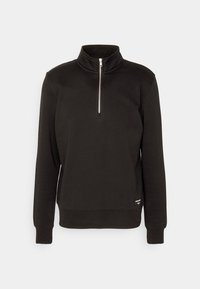 Sudadera negra de cuello alto y con cierre de cuarto de cremallera en la parte frontal. Presenta mangas largas y un dobladillo acanalado. Fabricada en un tejido suave.