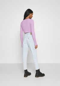 Levi's® HIGH WAISTED MOM JEAN - Mom Jeans - what the flip