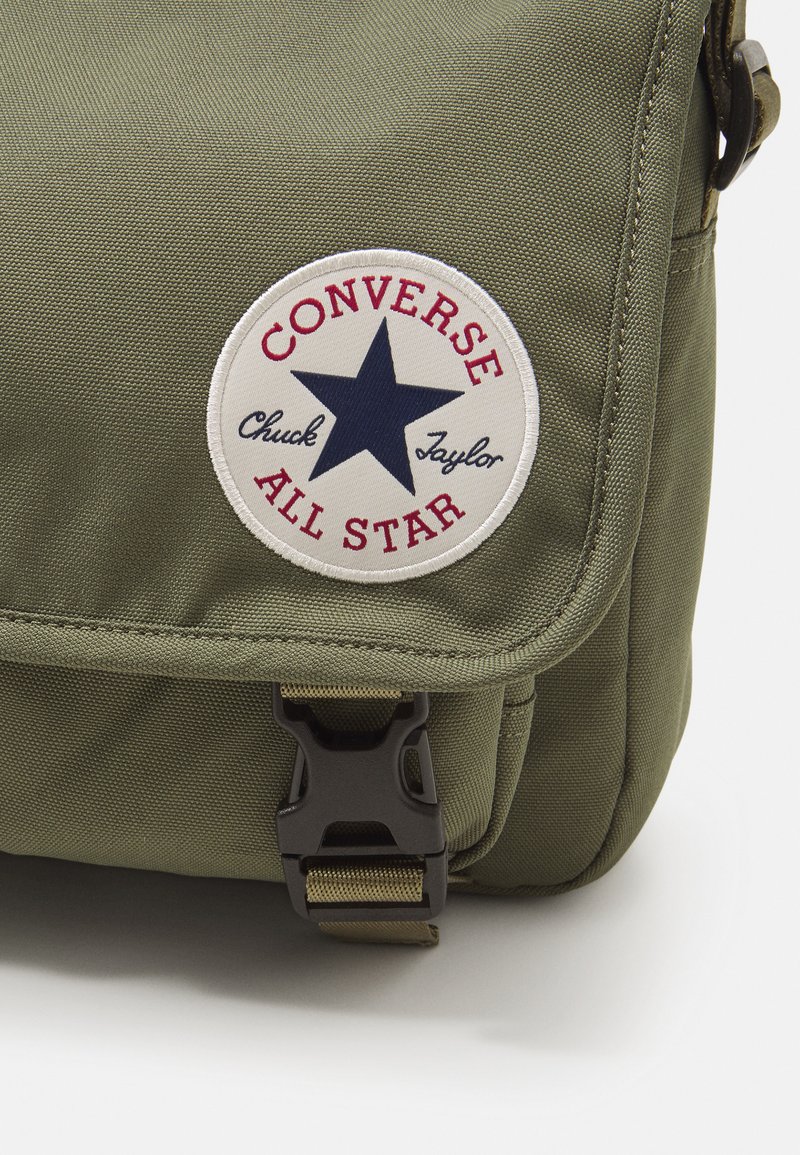 tracolla converse