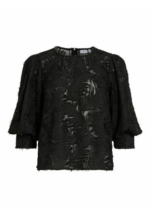 Juoda tekstūruota bluzonė su pūkuotomis rankovėmis, turinti permatomą uždengimą ir sudėtingas lapo formos raštus, užsegama nugaros pusėje su nepastebimu užtrauktuku.