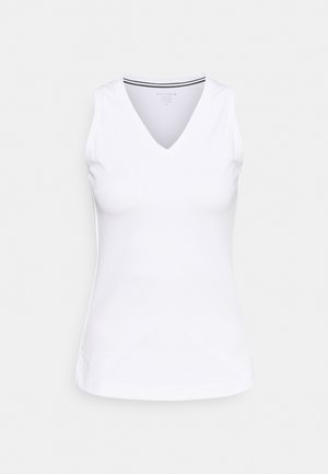 Top bianco aderente senza maniche con scollo a V, realizzato in tessuto liscio, con una sobria bordatura a righe nere e bianche sullo scollo.