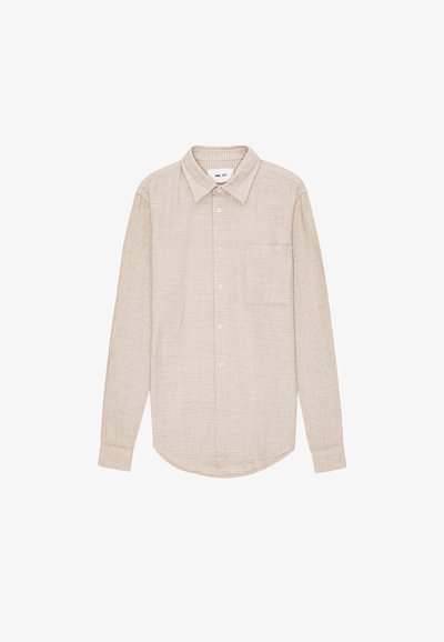 Chemise beige à motifs à carreaux, manches longues, col boutonné, poche poitrine unique et ourlet arrondi.