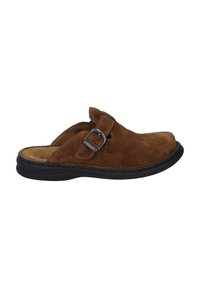 Brown suede slip-on shoe with a rounded toe, adjustable strap, and dark rubber sole. Features a buckle accent and stitched detailing.