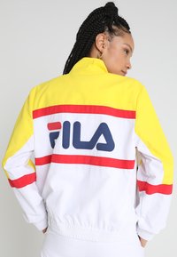 Fila KAYA WIND Veste coupe-vent empire yellow/bright white