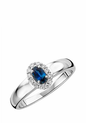 Silberring mit einem ovalen blauen Edelstein, umgeben von kleinen klaren Steinen, mit einem polierten Band und glatter Oberfläche.