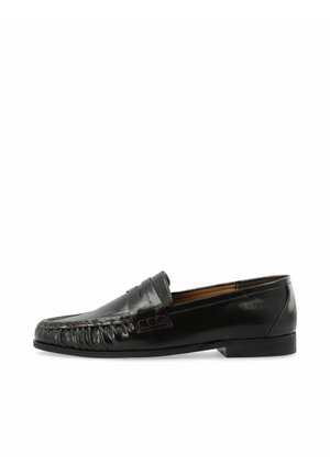 Black leather men's loafer with moc toe design, low heel, and slip-on style.