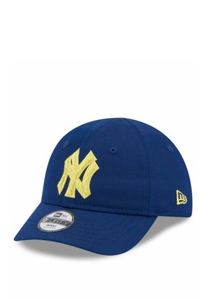 Navy cap with a yellow embroidered logo, curved brim, and six-panel design. Features a textured fabric and an adjustable strap.