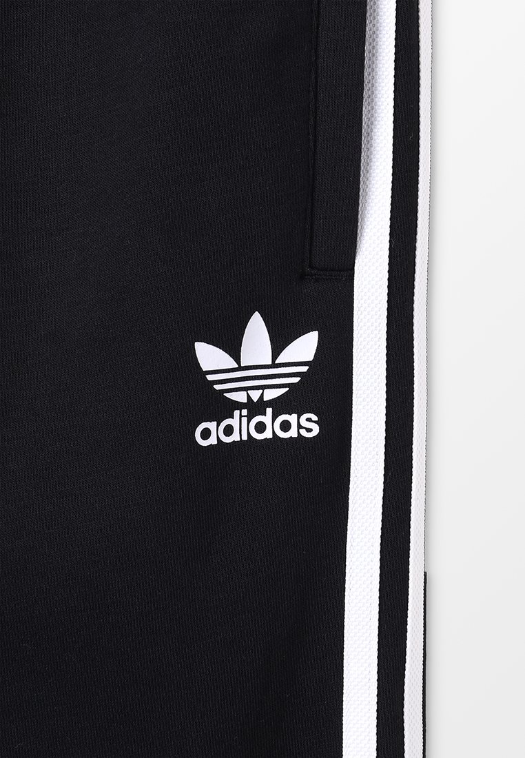 adidas Originals TREFOIL PANTS - Trainingsbroek - black/white/Zwart -  Zalando.nl