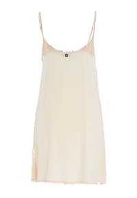 Robe sans manches de couleur beige clair avec une coupe décontractée, présentant un ourlet à franges et des bretelles ajustables. Fabriquée dans un tissu doux et transparent.