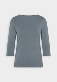 Grå topp med 3/4-långa ärmar och rundad halsringning. Tillverkad av mjukt tyg, den har en slät yta och en något lös, avslappnad passform.