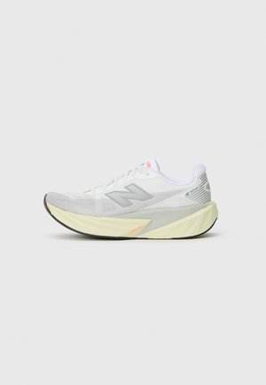 Lightweight running shoe with a white mesh upper, grey accents, and a textured off-white sole featuring the "FuelCell" branding.
