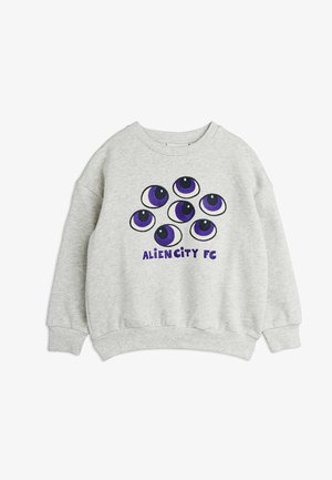 Sweat-shirt gris clair avec un graphisme de sept yeux violets et noirs et un texte violet "ALIEN CITY FC" sur le devant, avec poignets et ourlet côtelés.