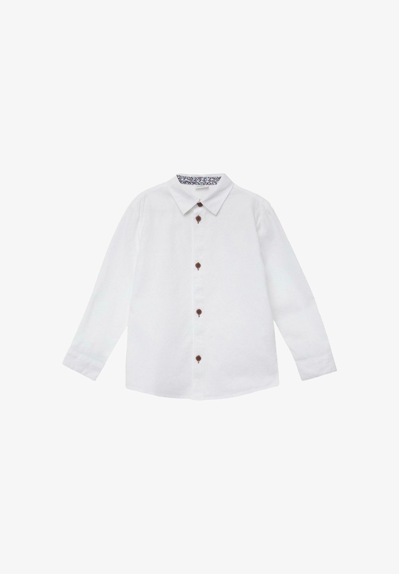 Chemise blanche à manches longues avec col, dotée de boutons marron sur le devant et d'un tissu intérieur du col à motif. Matière en coton texturé.