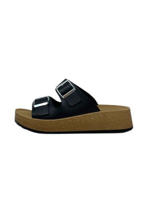 Sandali neri slip-on con due cinturini regolabili, dettagli in argento e suola piatta in sughero con texture di colore marrone chiaro.