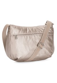 Light beige shoulder bag made of a smooth, shiny fabric. Features a front zip pocket and an adjustable fabric strap. Rounded shape.
