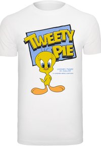 Hvit bomulls t-skjorte med en tegneserieaktig gul kanarifugl, teksten "TWEETY PIE" i fete gule bokstaver, blå bakgrunn med prikkete mønster.