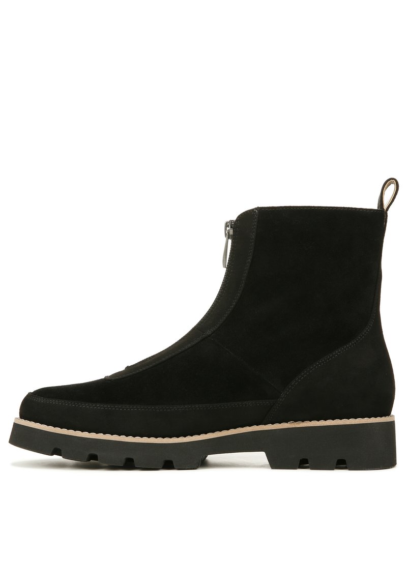 Black suede ankle boot with a textured surface, side zipper closure, and contrasting beige sole. Sturdy design with minimal accents.