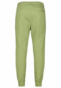 Gröna bomulls-joggers med elastisk midjeband, avsmalnande ben design och en enda bakficka. Mjukt textur och avslappnad stil.