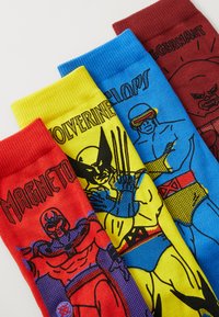 Four pairs of socks, featuring bold colors: red, yellow, blue, and burgundy. Each sock displays graphic designs of characters, including text.