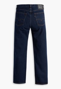 Tmavě modré džíny z denimu s rovný střih, pěti kapsami a kontrastním šitím. Na zadní straně se nachází kožená nášivka s logem značky.