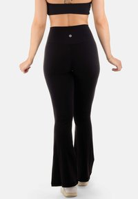 YantraConnection KISIMA EVASÉ - Pantaloni - black