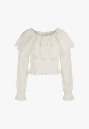 Crèmekleurige blouse met lange mouwen, brede ruches van opengewerkte kant en een geplooide taille, met subtiele bloemrijke borduursels en ruches aan de manchetten.
