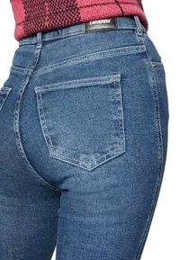 Dr.Denim MOXY - Calças de ganga de corte skinny - cape mid blue