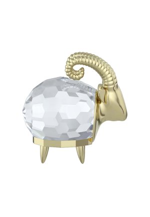 Kristallfår figur med en facetterad, genomskinlig kropp och gyllene detaljer, med lockiga horn och tre gyllene ben.