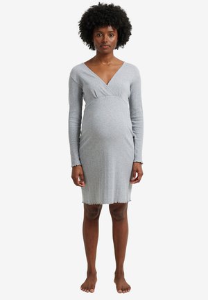 Grey ribbed knit dress with long sleeves and a v-neckline. Features a fitted silhouette and fringed hem. Soft texture, suitable for maternity wear.