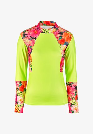 Langärmige sporttop in neon groen met bloemen- en schaakbordpatroon accenten op de schouders en mouwen. Gemaakt van gladde, rekbare stof.