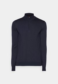 Pull bleu marine à manches longues avec un col à fermeture éclair d'un quart et des poignets et une taille côtelés, présenté sur un fond clair uni.