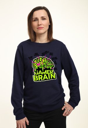 Námořnická mikina s výraznou neonově zelenou grafikou mozku a textem "GAMER BRAIN"; bavlněný materiál; dlouhé rukávy; žebrované manžety.