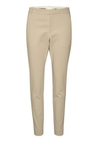 Pantaloni beige chiaro realizzati in un tessuto morbido, con un design aderente, tasche laterali e una silhouette a gamba affusolata.