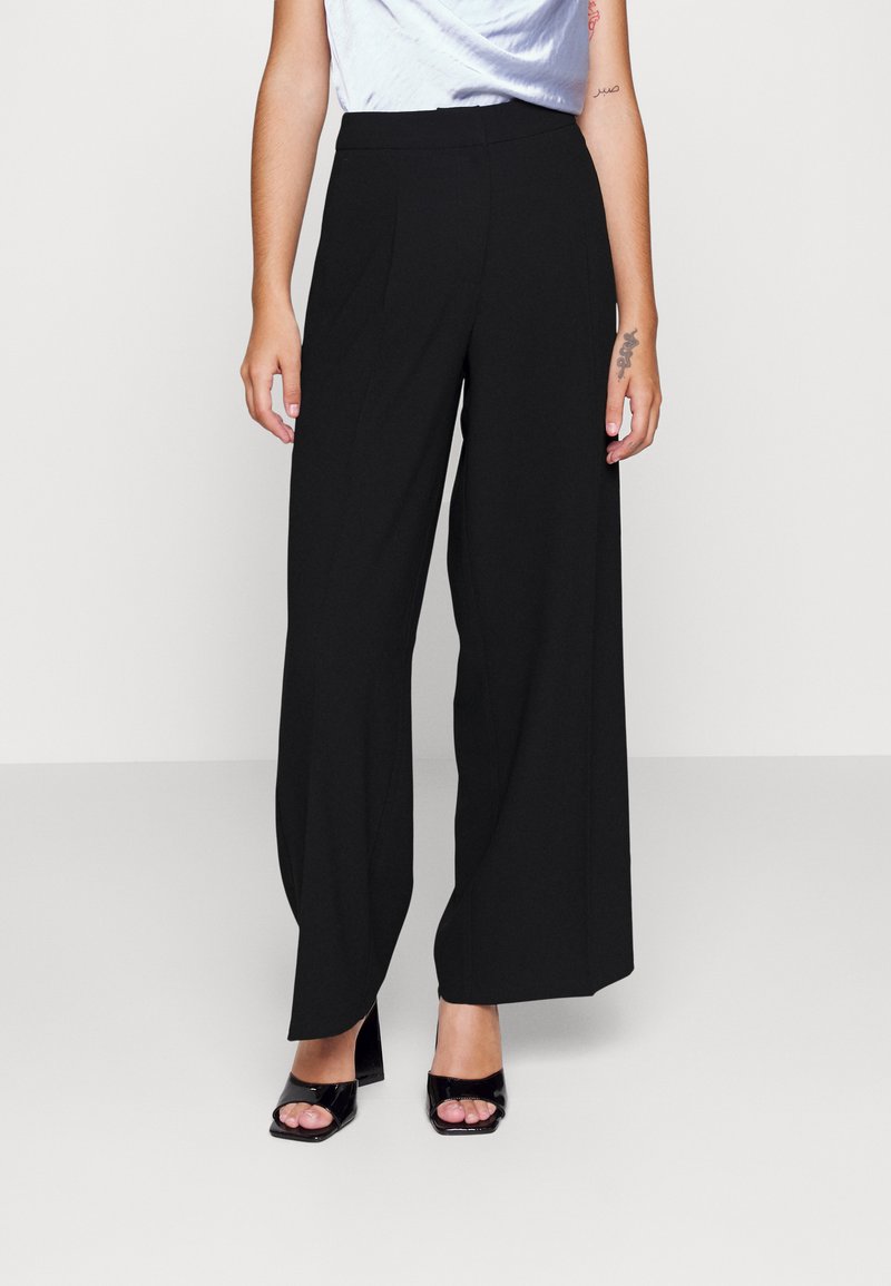 Selected Femme Petite SLFTINNI WIDE PANT Trousers black Zalando.co.uk