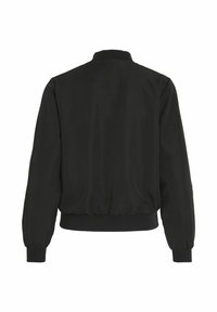 Blouson aviateur noir avec col, poignets et ceinture côtelés, présenté de dos sur fond blanc.