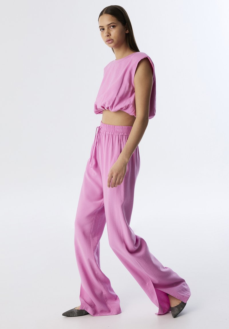 Twist Tracksuit bottoms vıolet/purple Zalando