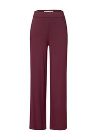 Pantalons larges bordeaux en tissu doux avec une taille extensible, présentant un design simple sans motifs ni ornements visibles.